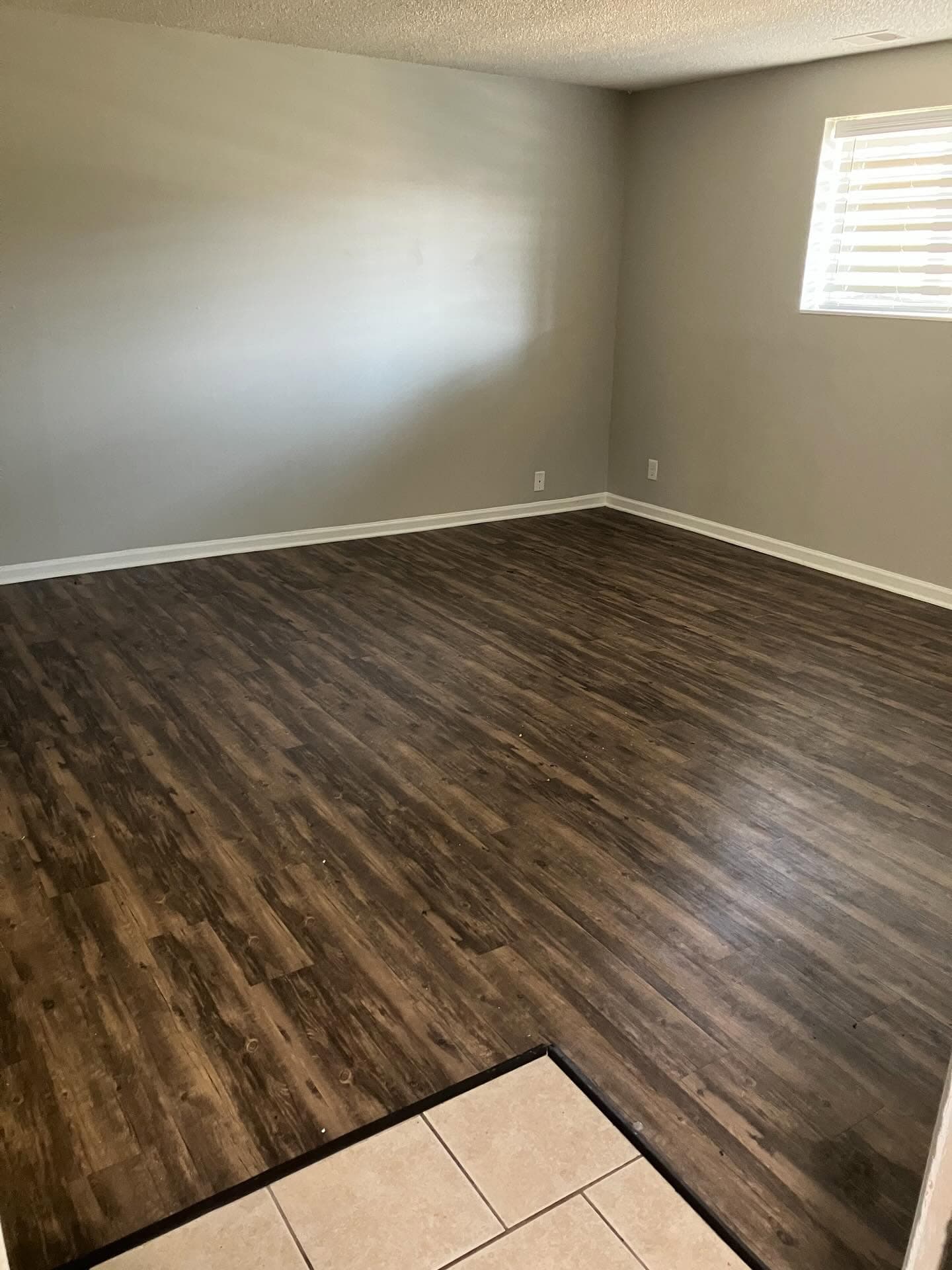 Cleared apartment room ready for the next trade.