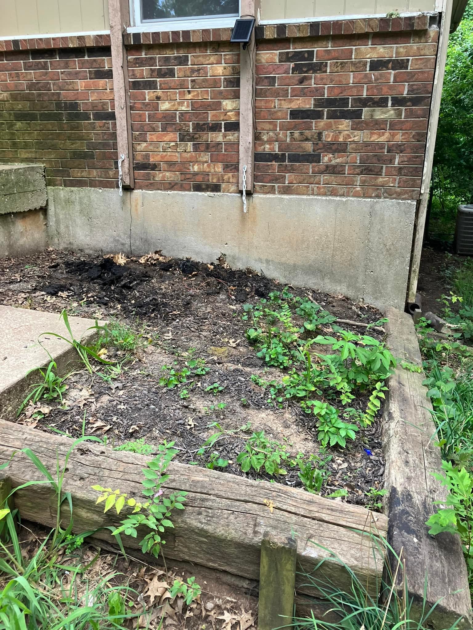 Cleared exterior area after eviction set-out hauling.