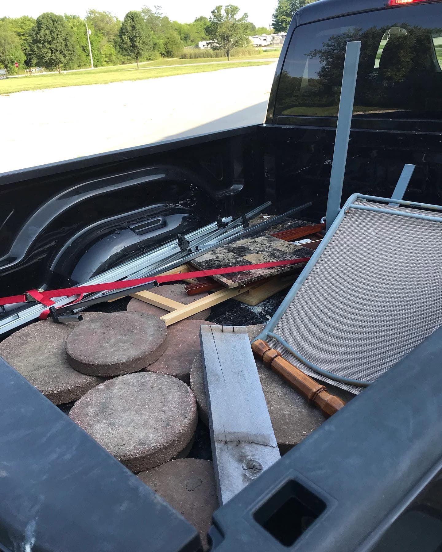 Pavers and delivery items loaded in a truck bed.