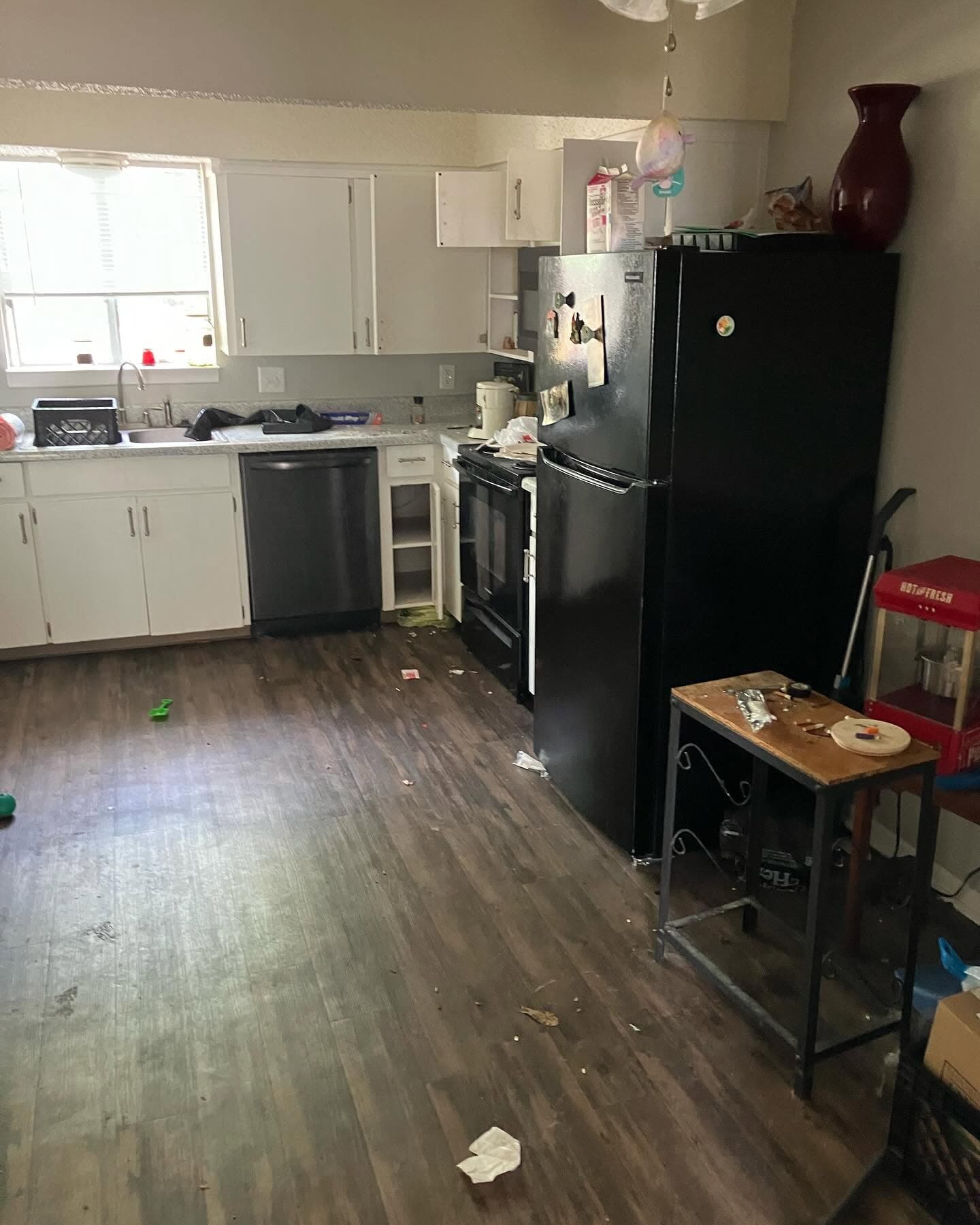 Apartment kitchen before a vacant unit cleanout.