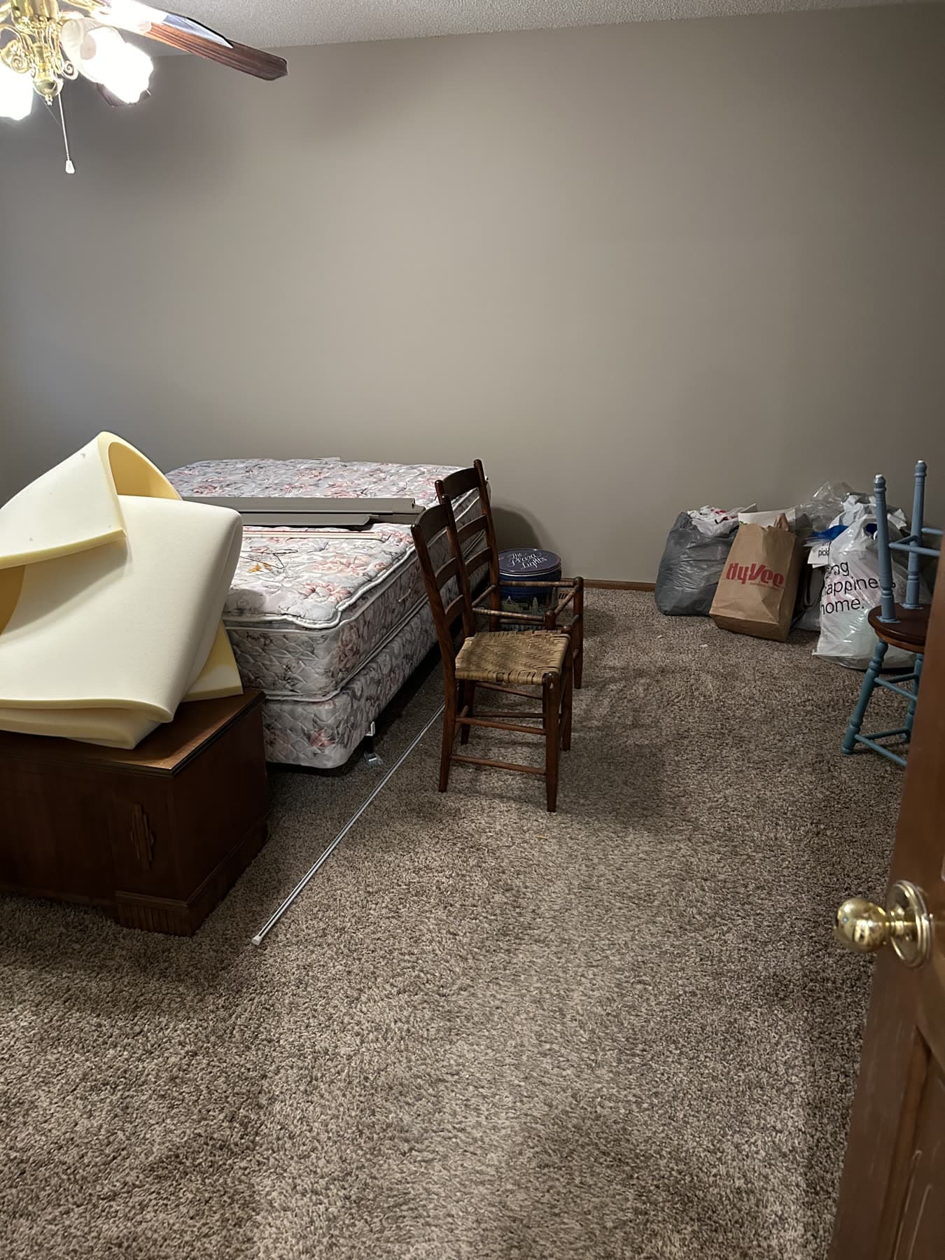 Residential room with furniture and household items ready for cleanout